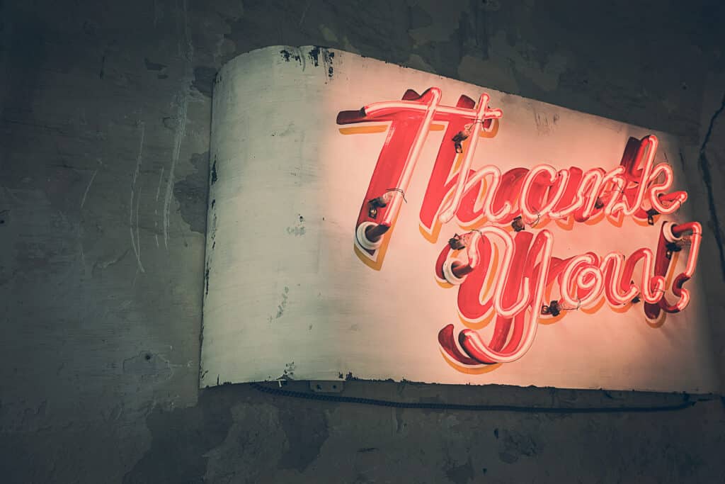 Thank You in red color neon light with exclamation