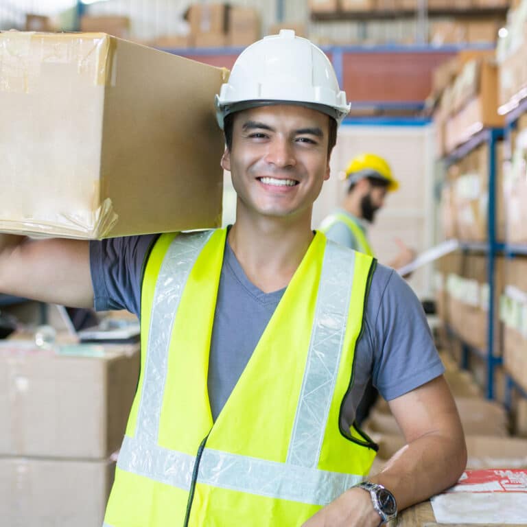 Warehouse worker holding package